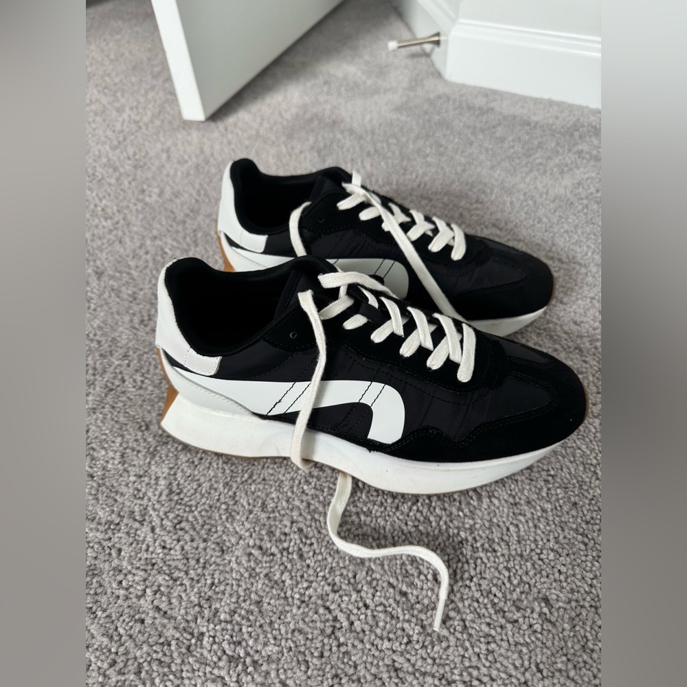 Black and white Steve Madden platform sneakers
